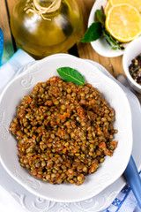Lentil stew in tomato sauce with cinnamon and spices