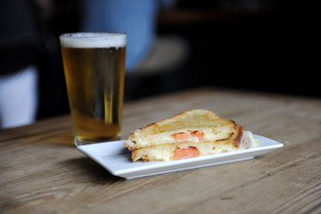 Grilled cheese and beer at a bar for lunch