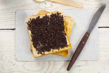 outdoor spring breakfast sweet bread spread on wooden table