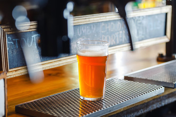 Pale ale on a bar counter