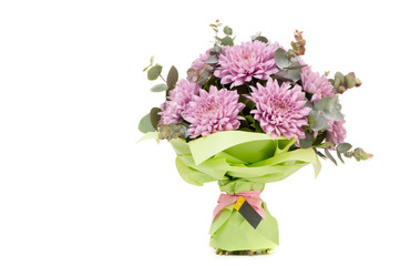 pink dahlia and aster in a paper bouquet tied ribbon on a white background. Valentine's Day