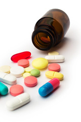 Pharmacy. Many colored pills and jar