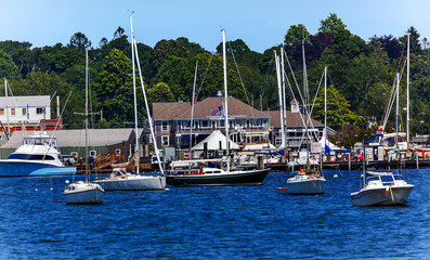 Fototapeta na wymiar Yacht Club Padnaram Harbor with Boats Docks Piers Massachusetts