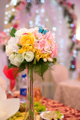 Festive bouquet with decorative butterfly