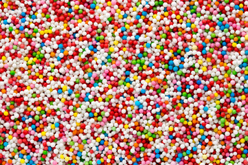 Multicoloured sweet sugar balls. Small ball pattern.