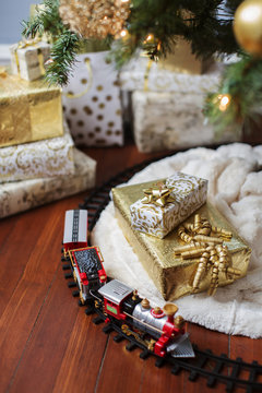 High angle view of miniature train and gift boxes