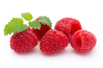 Ripe red raspberries isolated on white background.