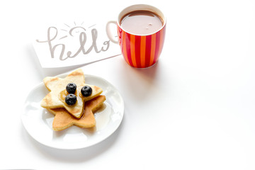concept kid breakfast with pancake on white background