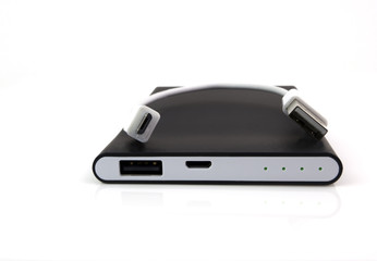 Rechargeable backup battery for small electronic device. White background.