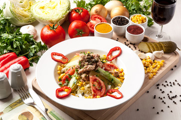 ceasar salad in the plate and many eating product