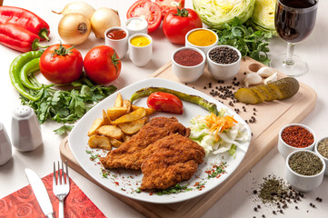 schnitzel with many vegetables and beautiful presentation