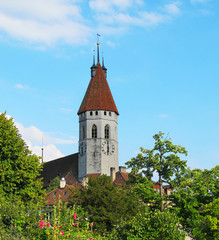 Obraz premium View of medieval clock tower in the countryside, Switzerland