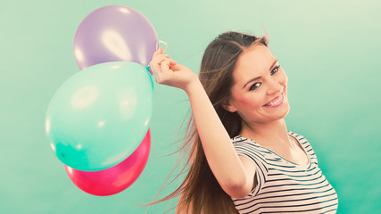 Woman summer joyful girl with colorful balloons