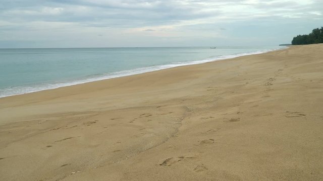 video of  the sea and exotic beach in the summertime.  Mai Khao beach, Phuket
