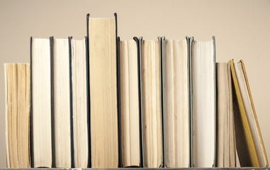 Composition of hardback books. Back to school.Education background Copy space for text.