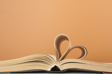 Heart from book page.Education background.Copy space for text.