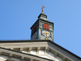 Stunning vintage clock tower under the sunny blue sky, Ljubljana, Slovenia