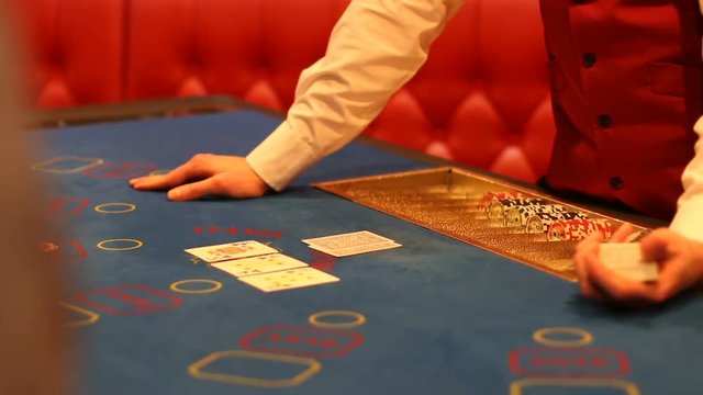 dealer lays out the cards