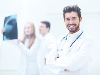 Fototapeta premium Professional doctor at hospital with crossed arms