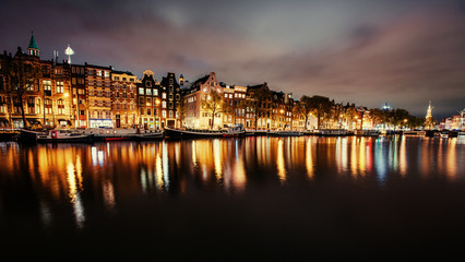 Fototapeta na wymiar Beautiful night in Amsterdam. illumination of buildings an