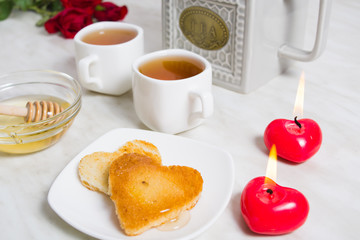 Easy breakfast for the Valentine's day with two piece of bread,