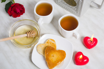 Easy breakfast for the Valentine's day with two piece of bread,