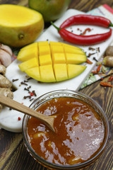 Bowl of homemade Mango Chutney on old wooden table