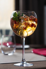 refreshing coctail with strawberries isolated on a bar background