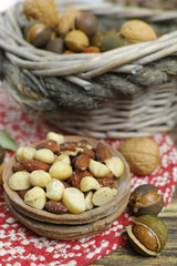 Roasted salted nuts mix, snack from macadamia, walnuts and almonds