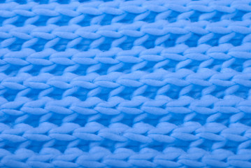 Blue wool knitted texture.