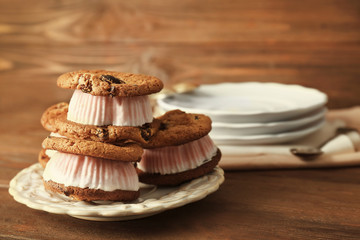 Ice cream cookie sandwiches on plate on table