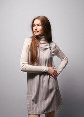 Fototapeta premium Beautiful young woman on color background