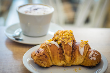 Saint martin croissant and cup of coffee