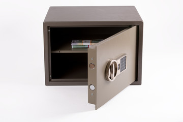 Safe with combination lock on white background