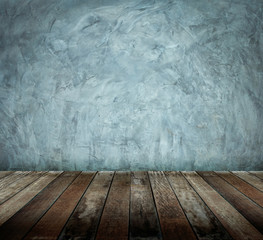 Old grunge rustic metal wall with wooden tabletop under use for products display