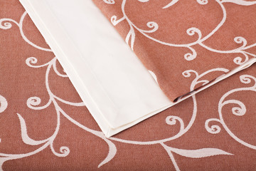 top view of tablecloth with colorful floral pattern. 