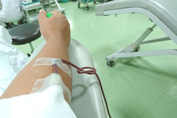 Arm blood donor at donation in the hospital