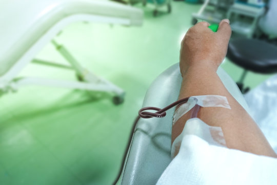 Arm blood donor at donation in the hospital