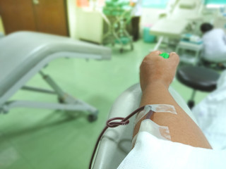 Arm blood donor at donation in the hospital