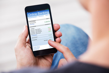 Man Banking Online Using Mobile Phone