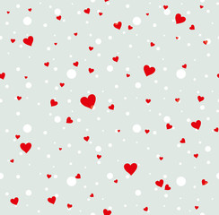 Seamless pattern of red hearts and white polka dots.