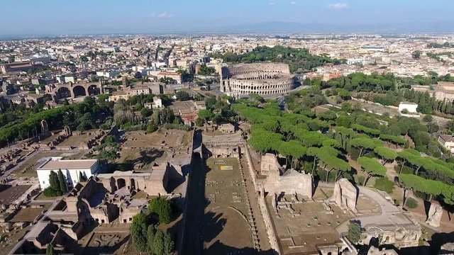 Aerial bird view Italy Rome flying over Domus Severiana moving slowly forwards extension to imperial palaces Palatine Hill in Roma popular tourist attraction in large and beautiful city center 4k