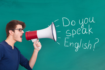 Man Doing Announcement Of English Speaking On Megaphone