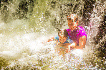 Fototapeta premium thermal river in forest, kerosene creek, rotorua, new zealand