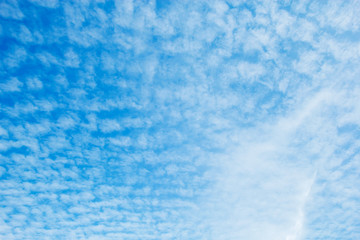 Blue sky with clouds background