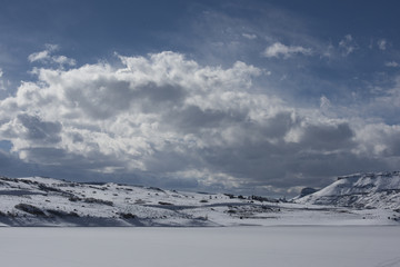 Fototapeta premium Clouds over Blue Mesa Reservoir, Curecanti National Recreation Area.