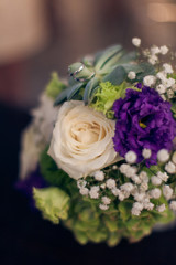 Beautiful wedding bouquet and rings