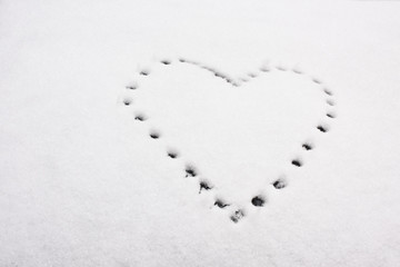 Shape of heart on snow