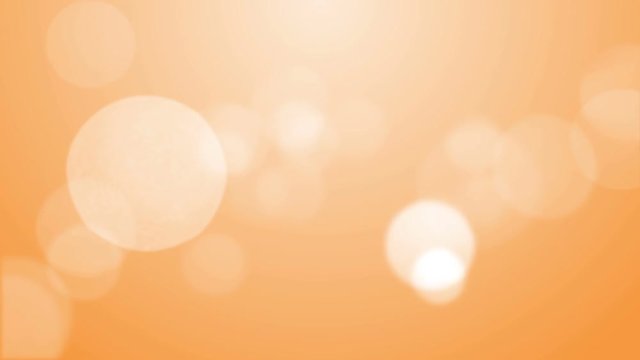 Orange bokeh lights looped animated abstract background