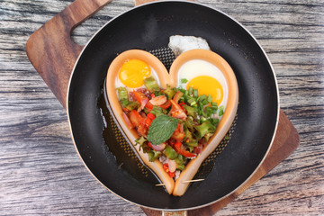 Sausage cheese in heart style with spicy wing bean salad.